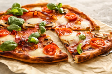 Delicious pizza on table, closeup