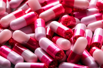 Many colorful pills, closeup