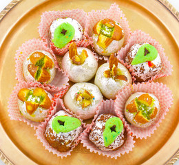Indian Traditional Mix Sweet Food or Mix Mithai include Peda, Mawa Burfi, Dry Fruits Sweet, Halwa or Coconut Burfi