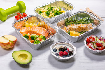 Healthy food delivery concept - meals in fossil containers, copy space