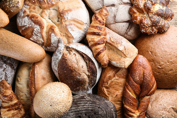 Freshly baked bread products as background