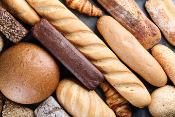 Freshly baked bread products as background