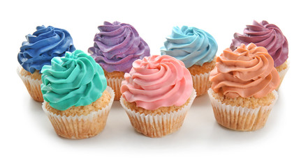 Colorful cupcakes on white background