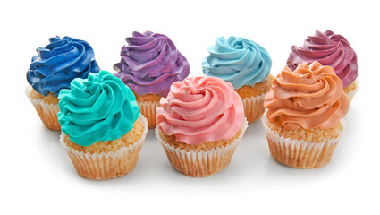 Colorful cupcakes on white background