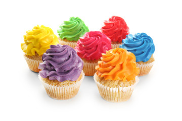Colorful cupcakes on white background