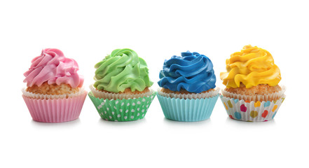 Colorful cupcakes on white background