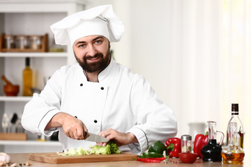 Male chef cooking in kitchen