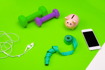 Piggy bank with sports equipment