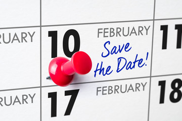 Wall calendar with a red pin - February 10