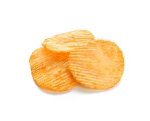 Tasty crispy potato chips on white background