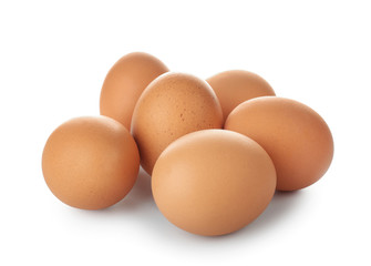Raw chicken eggs on white background