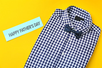 Male shirt on color background. Father's Day celebration