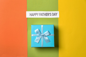 Gift box for Father's Day on color background