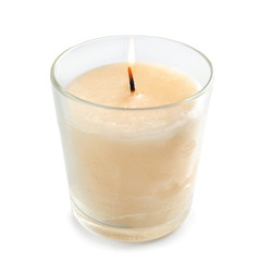 Burning candle on white background