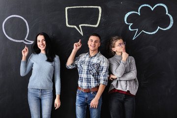 People and blank speech bubbles on dark background