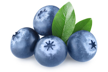 Ripe blueberries with green leaves, isolated on white background
