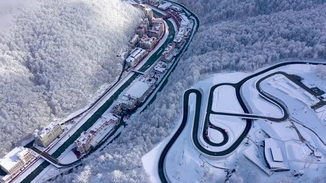 Aerial view of ski resort Gorky Gorod in Caucasus Mountains, Sochi, Russia. Mountain roads from above.