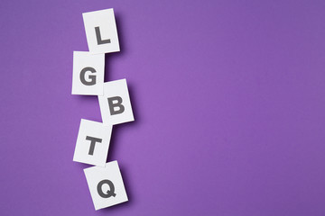 Abbreviation LGBTQ on color background
