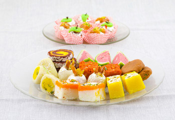 Indian Traditional Mix Sweet Food or Mix Mithai include Peda, Mawa Burfi, Dry Fruits Sweet, Halwa or Coconut Burfi