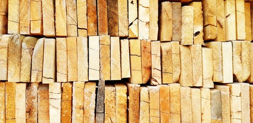 Pattern stacked of wood lumber, log or timber for background  - Art Wallpaper and Surface of Material concept 