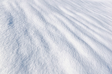 Fototapeta na wymiar surface textured of fresh snow 
