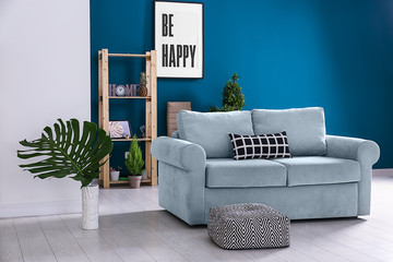Beautiful interior of modern room with comfortable sofa