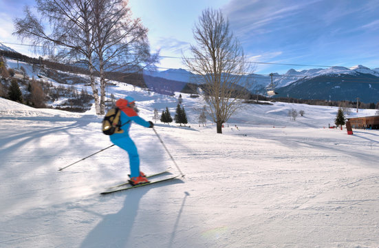 skier on the slope in resort shoot at slow speed