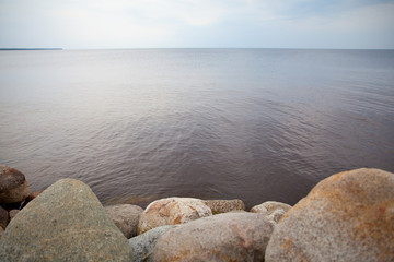A pile of stones on the lake.