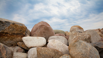 A pile of stones against the sky.