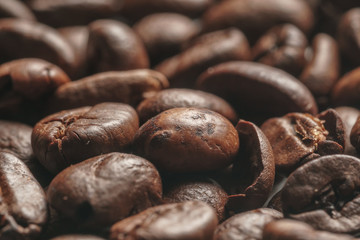 roasted coffee beans as background close up