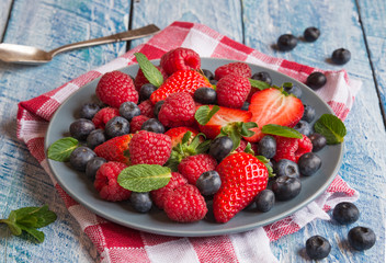 Fresh fruit salad on wooden table