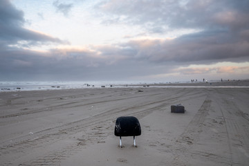 Environmental damage on island Terschelling the Netherlands containers in ocean