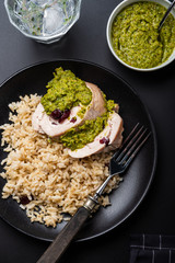 Sliced Chicken Roll with Cranberries, Pesto and Rice.