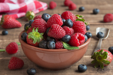 Fresh fruit salad on wooden table