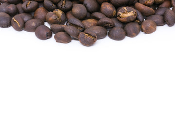 Fototapeta premium Coffee beans background texture with copy space for text. Royalty high-quality free stock macro photo image of roasted black coffee beans, coffee beans background. Close-up or macro photo coffee bean