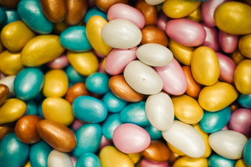 Fototapeta na wymiar Glazed colorful tasty candy nuts