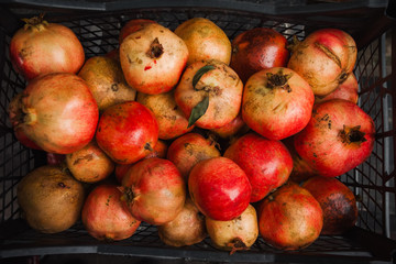 Fototapeta na wymiar Pile of pomegranate on the market