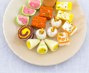 Indian Traditional Mix Sweet Food or Mix Mithai include Peda, Mawa Burfi, Dry Fruits Sweet, Halwa or Coconut Burfi
