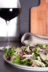 vegetable salad with chicken and red wine.