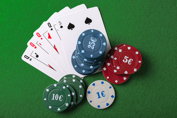 Chips and cards on table in casino