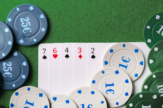 Chips and cards on table in casino