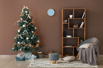 Beautiful fir tree in interior of room