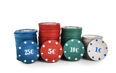 Chips for poker game on white background