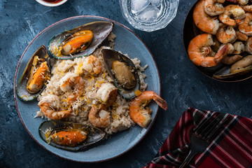 Risotto with seafood. Rice with shrimps and mussels.