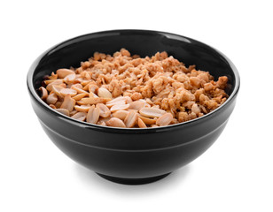 Bowl with tasty granola and yogurt on white background