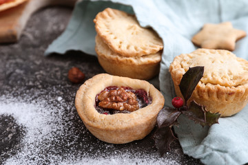 Tasty mince pies on grunge table