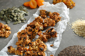 Ingredients for tasty granola bars on table