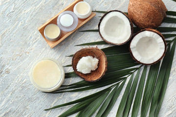 Composition with coconut oil on wooden background