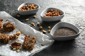 Ingredients for tasty granola bars on table