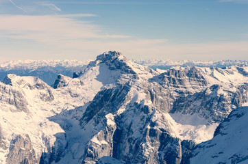Naklejka premium Spectacular winter mountain panorama with peaks covered with early snow.